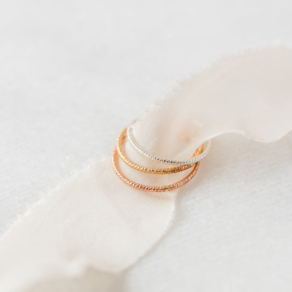 shop our selection of delicate ring bands, featuring a variety of textures and finishes in sterling silver, 14k gold fill or solid 14k gold