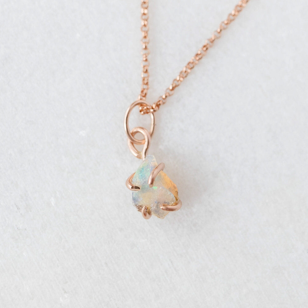 Raw opal charm 